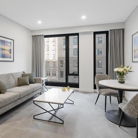 Meriton Suites Melburne Exterior foto Living room