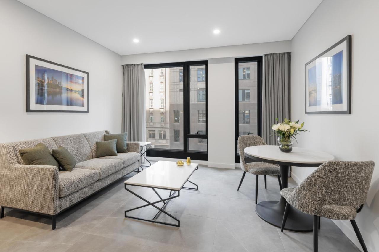 Meriton Suites Melburne Exterior foto Living room