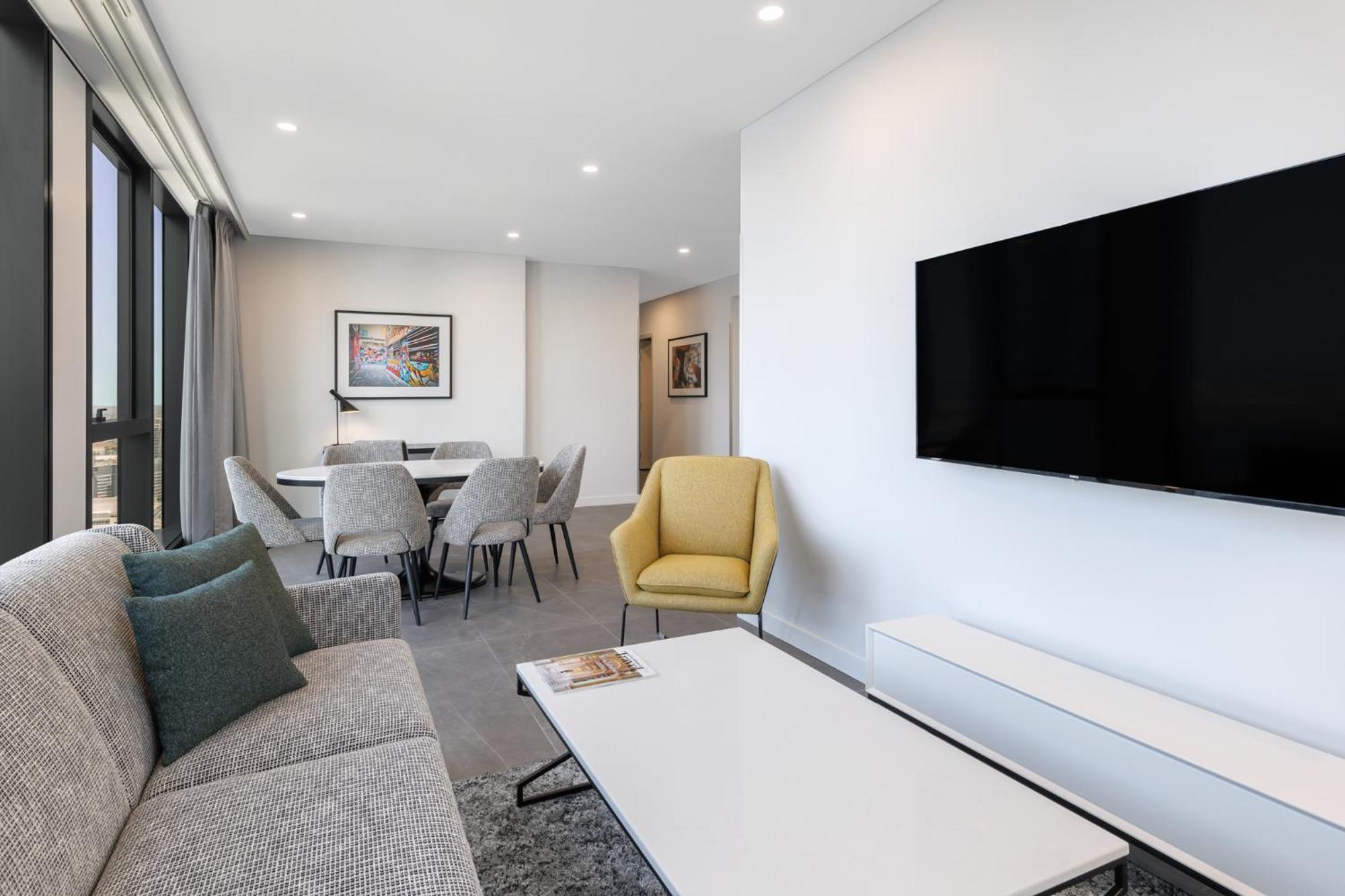 Meriton Suites Melburne Exterior foto A typical apartment interior