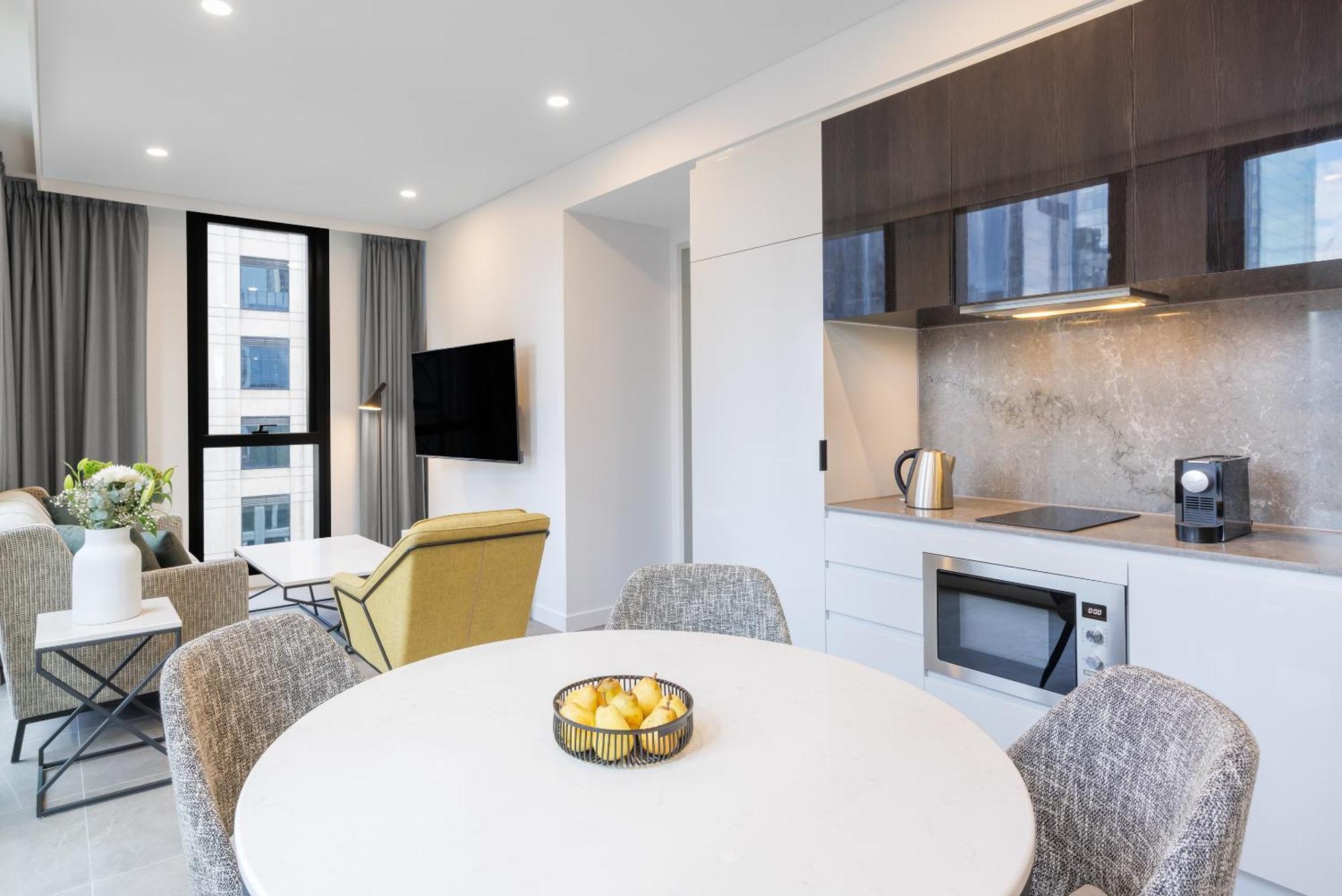 Meriton Suites Melburne Exterior foto A typical apartment interior