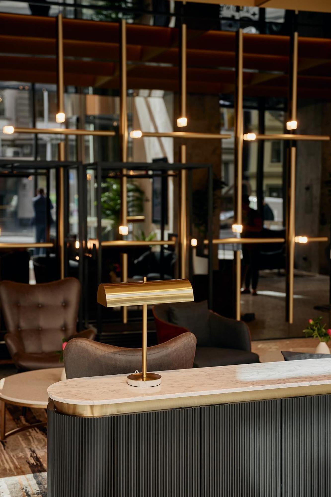 Meriton Suites Melburne Exterior foto The interior of the lounge