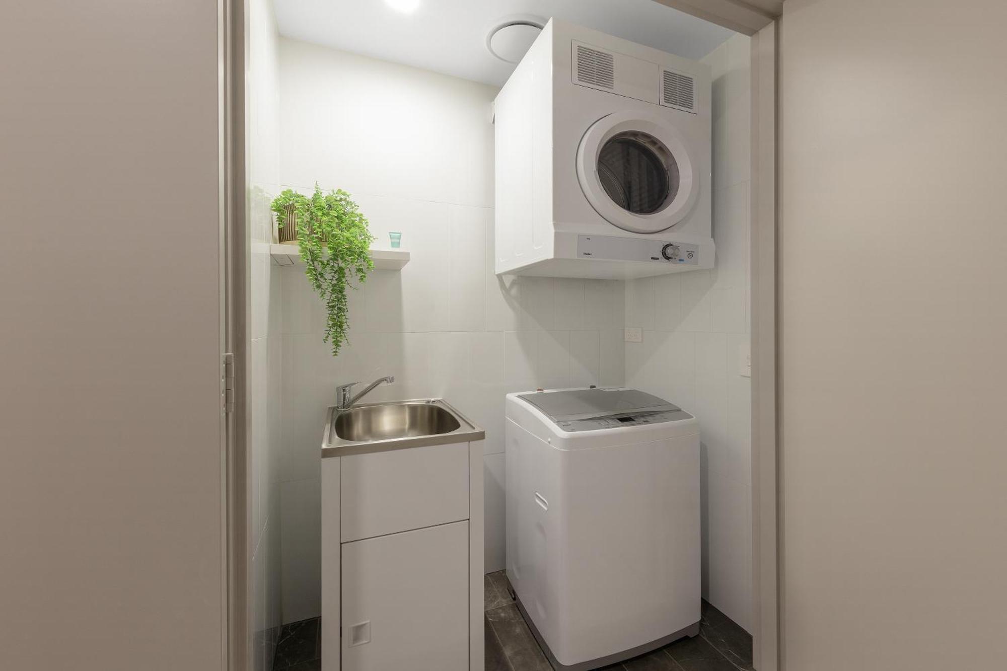 Meriton Suites Melburne Exterior foto Laundry room